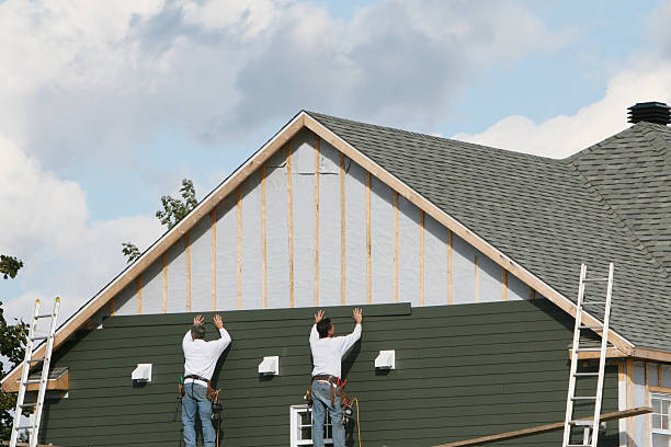 Professional Siding Installation technician working in Portland, IN